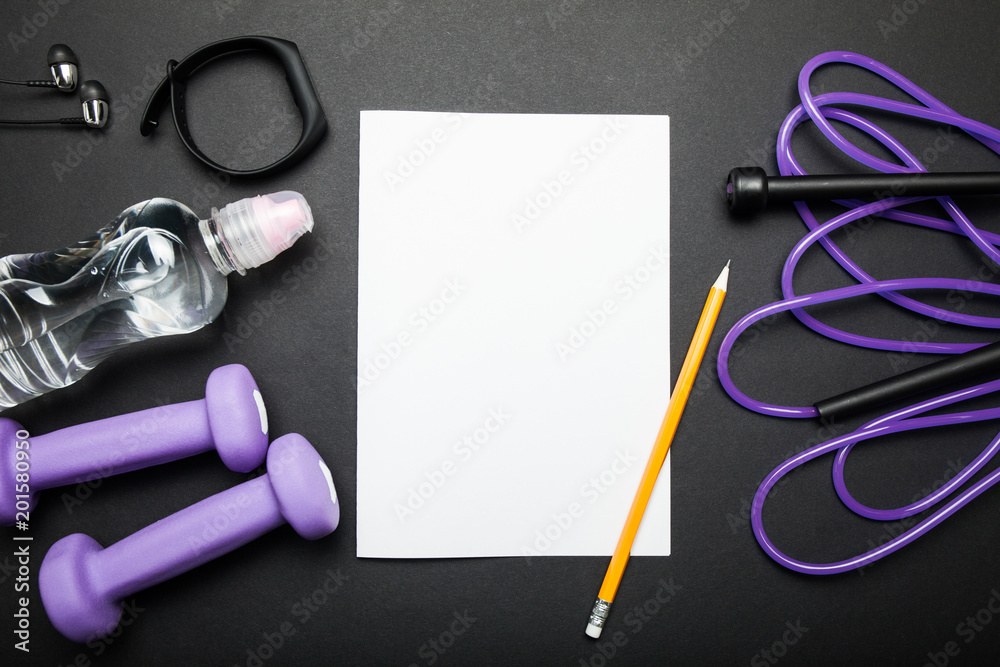 Workout sheet for fitness on a black background. Workout sheet for fitness on a black background.