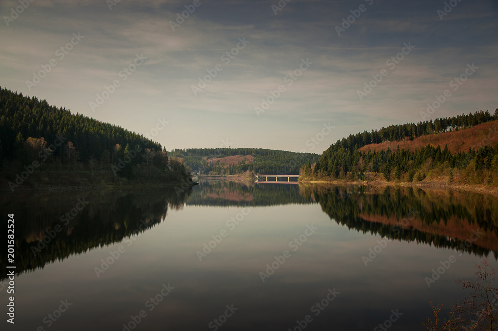 Panorama view of a mountain lake in the morning. Okertalsperre, Okerstausee, National Park Harz in Germany