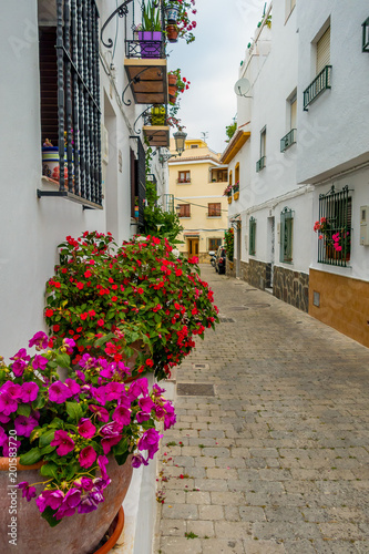 Houses with typical colors of the houses of Andalusia one day of summer of the year 2015