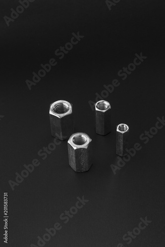 Steel connectors on a black background