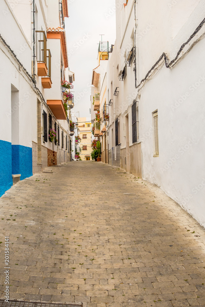 Beautiful views and streets of Frigiliana, village of Malaga on a summer day