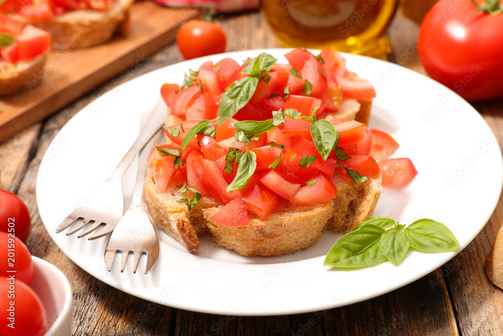 bread with tomato and basil