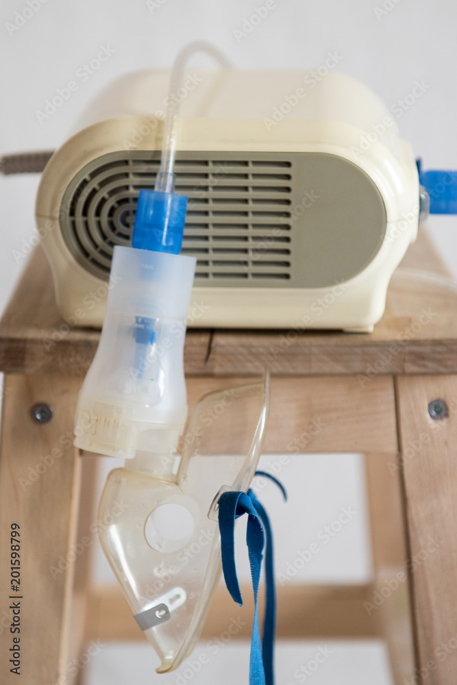 Medical equipment for inhalation with respiratory mask, nebulizer on white  background. Respiratory medicine. Asthma breathing treatment. Bronchitis,  asthmatic health equipment Stock Photo | Adobe Stock