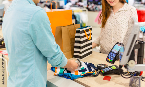 Making a purchase in clothes shop