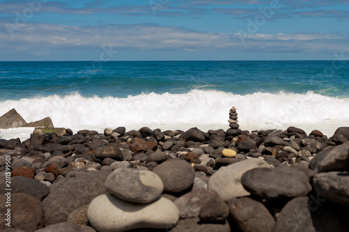 Stack of stones on the sea beach. Tenerife.