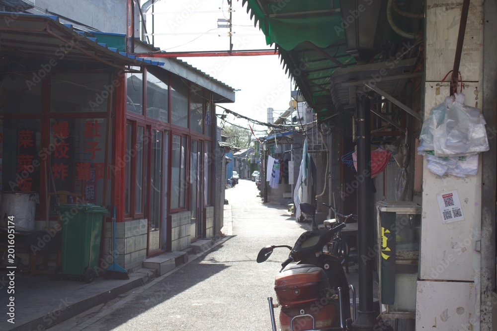 Naklejka premium Hutong Seitenstrasse am Laden