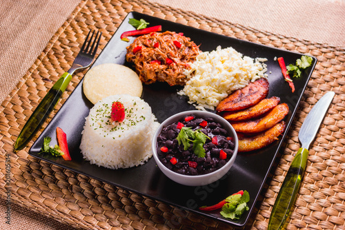 Pabellón criollo, Venezuelan food that has rice, meat, black beans, fried plantain and cheese
