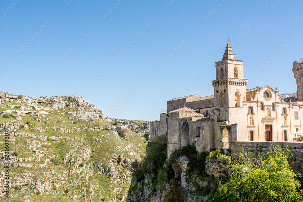 Horizontal View of the Church of San Pietro Caveoso, in the Sassi of Matera on Blue Sky Background. Matera, South of Italy