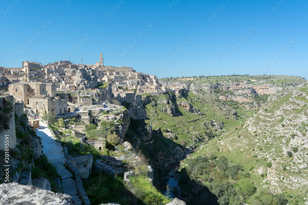 Obraz premium Horizontal View of the Sassi of Matera on Blue Sky Background. Matera, South of Italy