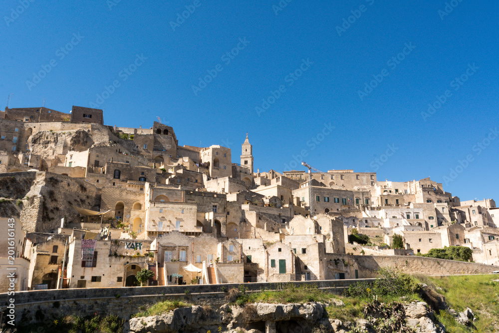 Horizontal View of the Sassi of Matera on Blue Sky Background. Matera, South of Italy