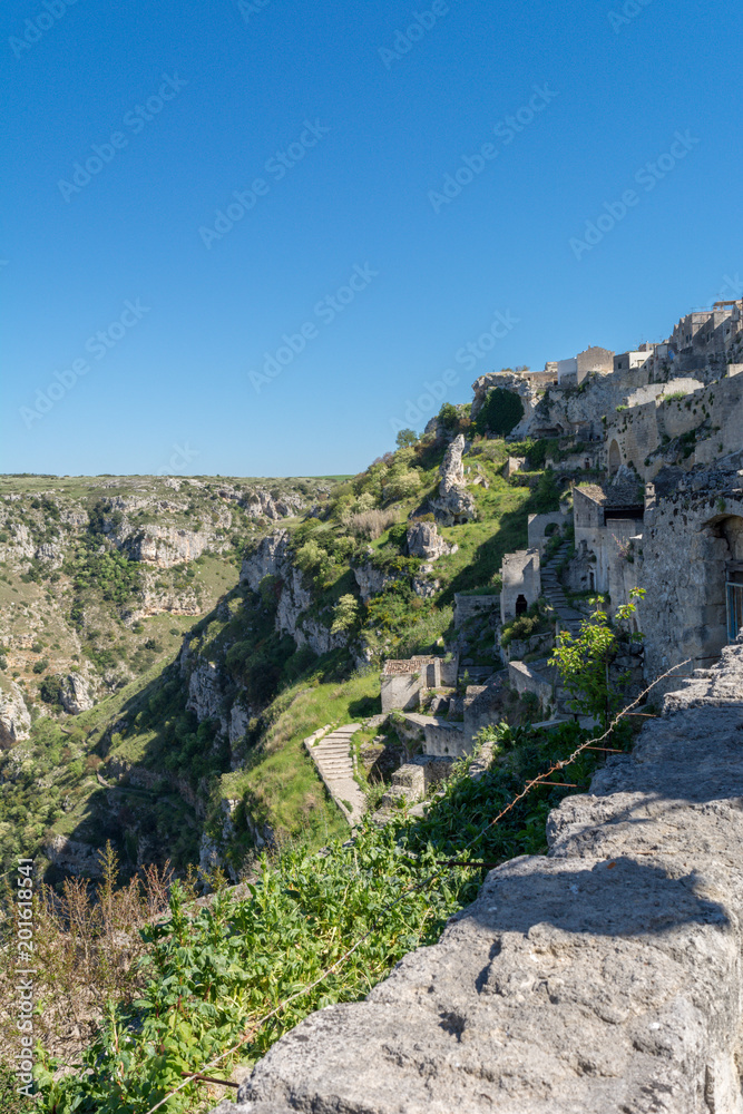 Vertical View of the Sassi of Matera on Blue Sky Background. Matera, South of Italy