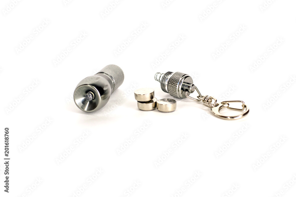small led flashlight disassembled on white background small led flashlight disassembled on white background