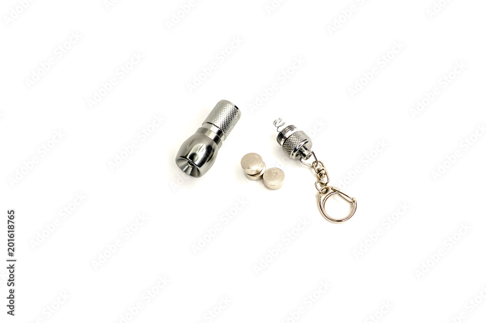 small led flashlight disassembled on white background small led flashlight disassembled on white background
