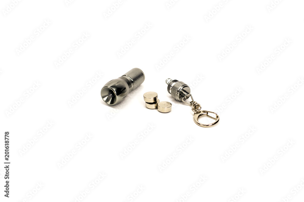 small led flashlight disassembled on white background small led flashlight disassembled on white background