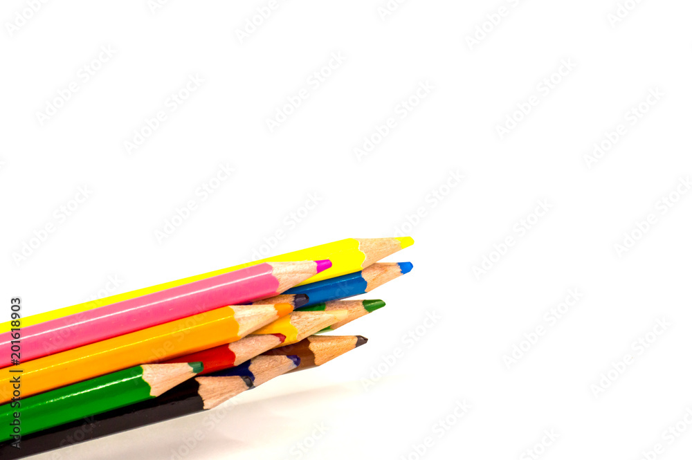 colored pencils lying on white background colored pencils lying on white background
