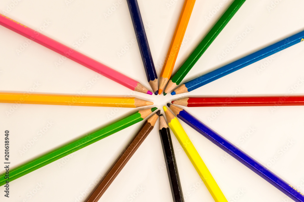 colored pencils lying on white background colored pencils lying on white background