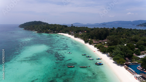 Bird’s eye view of tropical beach and rocky coast with crystal clear turquoise water on Thai island, pattaya beach,Koh Lipe