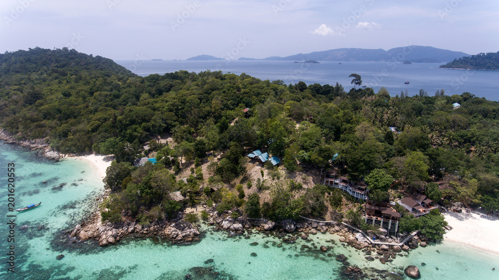 Bird’s eye view of tropical beach and rocky coast with crystal clear turquoise water on Thai island, pattaya beach,Koh Lipe