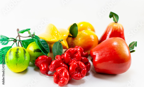 colorful plastic Toy fruits on white background