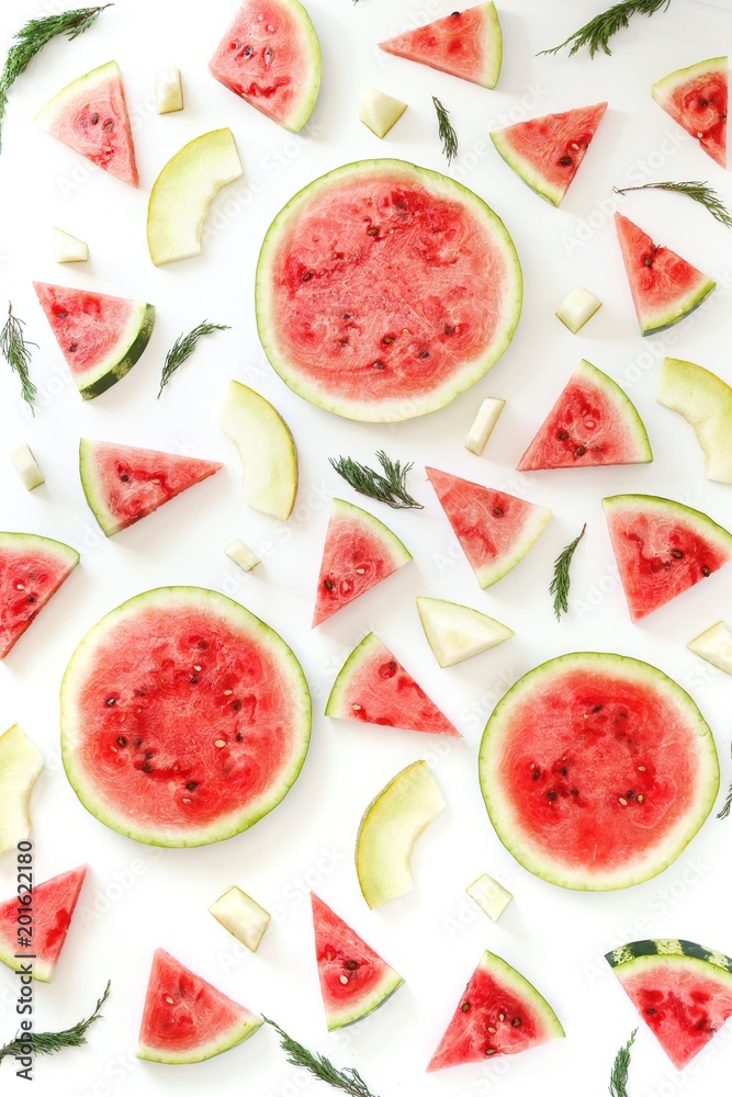 Pattern of watermelon lobules. Fresh watermelon, sliced in circles on a white background. Pattern of watermelon lobules. Fresh watermelon, sliced in circles on a white background.