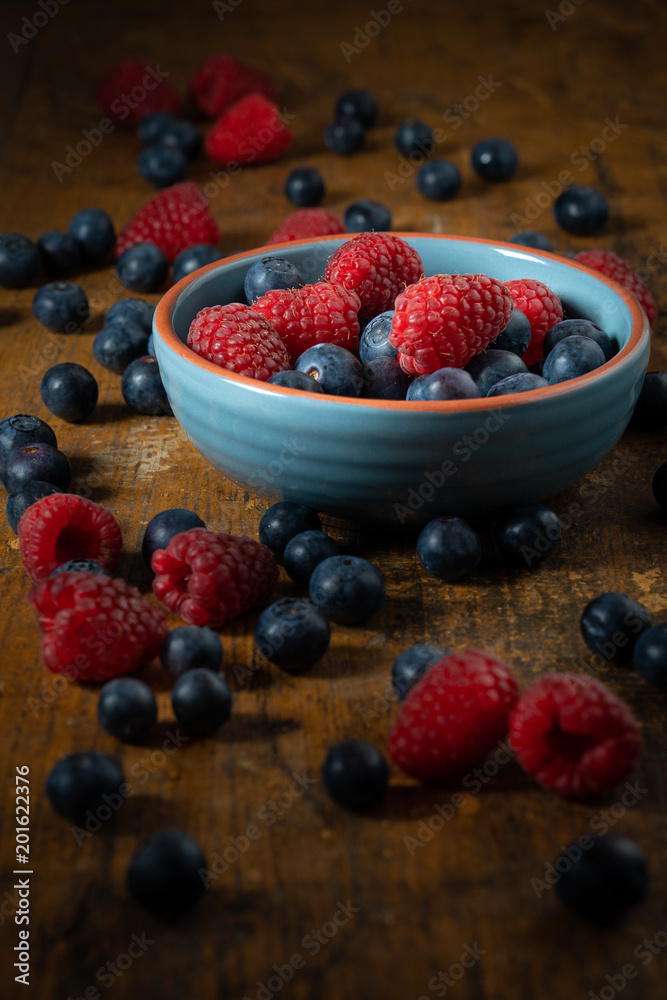 Berries in a blue bowl Berries in a blue bowl