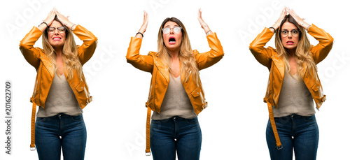 Beautiful young woman terrified and nervous expressing anxiety and panic gesture  overwhelmed over white background