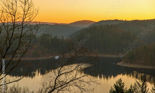 Dam Orlik in yellow sunrise.