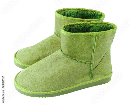 Chartreuse light green pair of short winter ugg boots isolated white photo