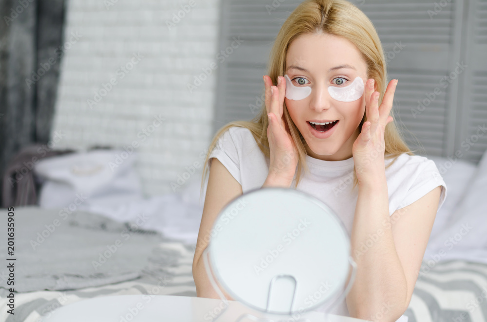 Face Skin Care. Portrait Of Beautiful Smiling Girl Removing White Under Eye Patches From Healthy Fresh Skin. Closeup Of Attractive Sexy Woman With Natural Makeup And Mask On Facial Skin. Face Skin Care. Portrait Of Beautiful Smiling Girl Removing White Under Eye Patches From Healthy Fresh Skin. Closeup Of Attractive Sexy Woman With Natural Makeup And Mask On Facial Skin.