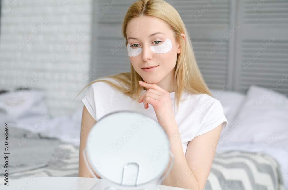 Face Skin Care. Portrait Of Beautiful Smiling Girl Removing White Under Eye Patches From Healthy Fresh Skin. Closeup Of Attractive Sexy Woman With Natural Makeup And Mask On Facial Skin. Face Skin Care. Portrait Of Beautiful Smiling Girl Removing White Under Eye Patches From Healthy Fresh Skin. Closeup Of Attractive Sexy Woman With Natural Makeup And Mask On Facial Skin.
