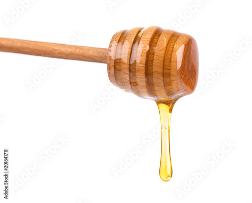 Honey dripping isolated on white background. Honey isolated