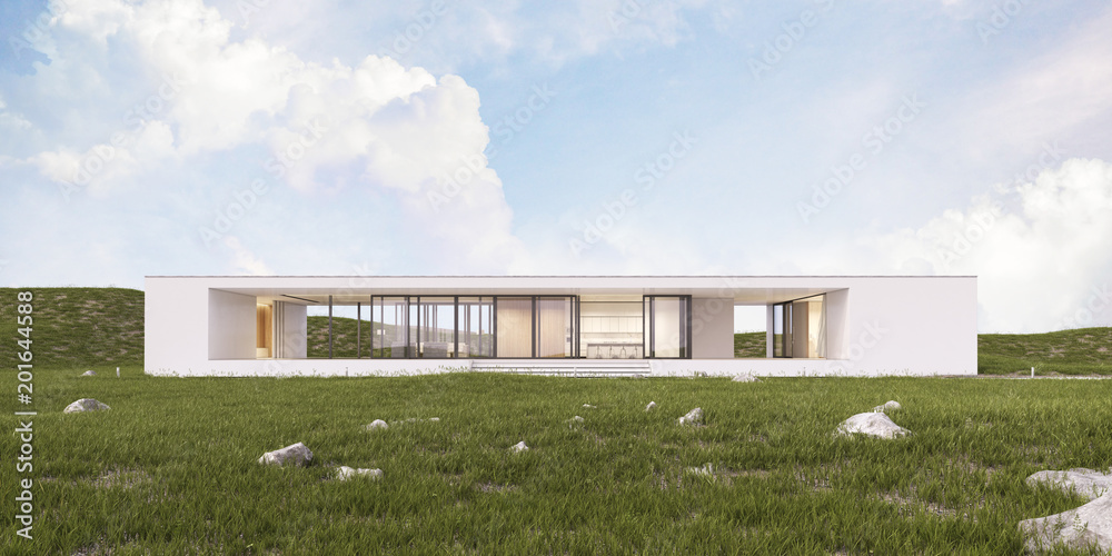 3D rendering of modern architecture with warm interior lighting and fog atmosphere on grass hill background,Concept of minimal design architectural.	