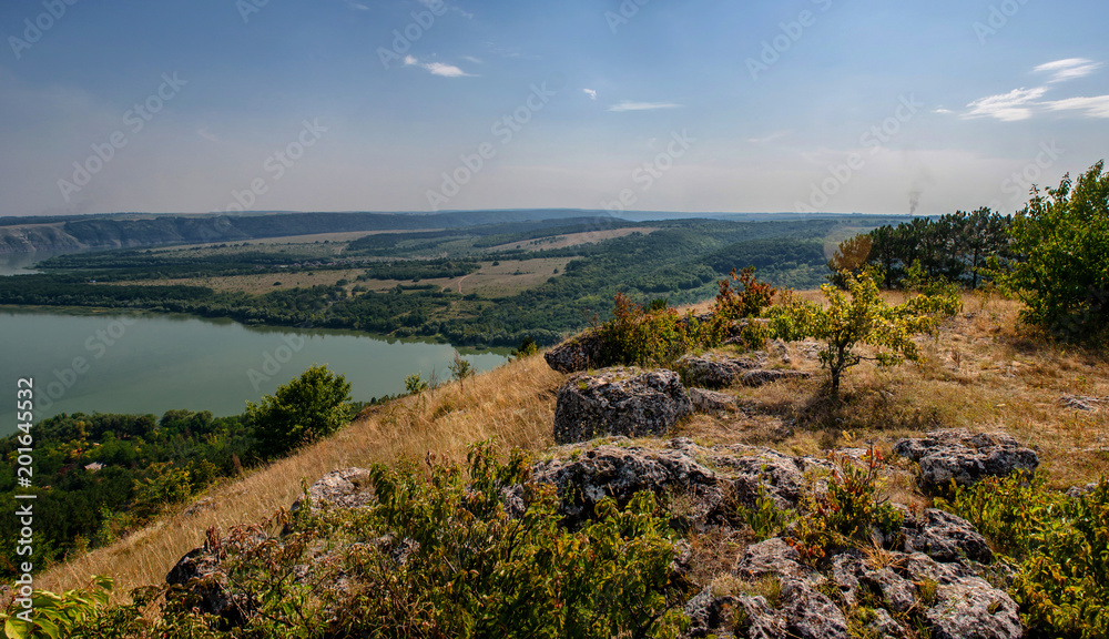 Scenic panorama view from the hill to the reservoir on the Dniester river, Ukraine. Scenic panorama view from the hill to the reservoir on the Dniester river, Ukraine.