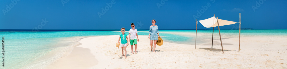 Mother and kids at tropical beach