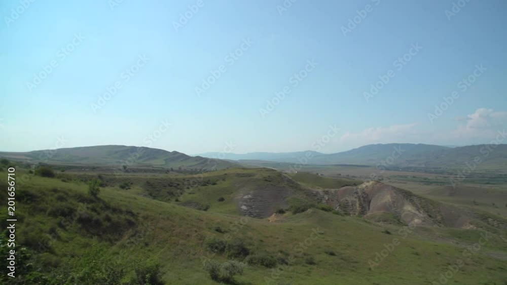 Summer landscape in mountains and the clear blue sky with clouds. Summer landscape in mountains and the clear blue sky with clouds.