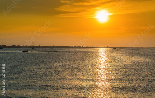 Sunset in the sea. Rimini in Italy. © Ms VectorPlus