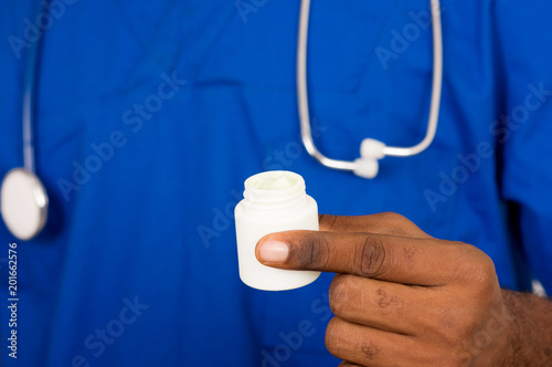 hand doctor holding a medicine box