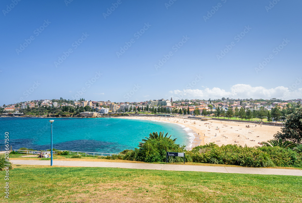 Sunny beautiful summer coast view to Sydney beach and blue Tasman Sea wild wave water and sandy white beaches perfect for surfing swimming hiking, Coogee to Bondi Walk, NSW/ Australia - 10 11 2017