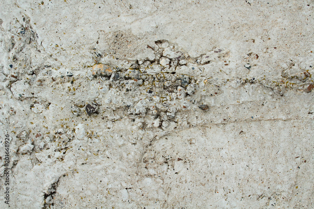 Gray reinforced concrete wall close-up. Background. Gray reinforced concrete wall close-up. Background.