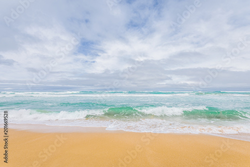 Enjoy this amazing sea view with pure sandy beach and crystal clear blue water a few waves coming to the shore at a lonely empty place on Tasmania, Australia © Thomas Jastram