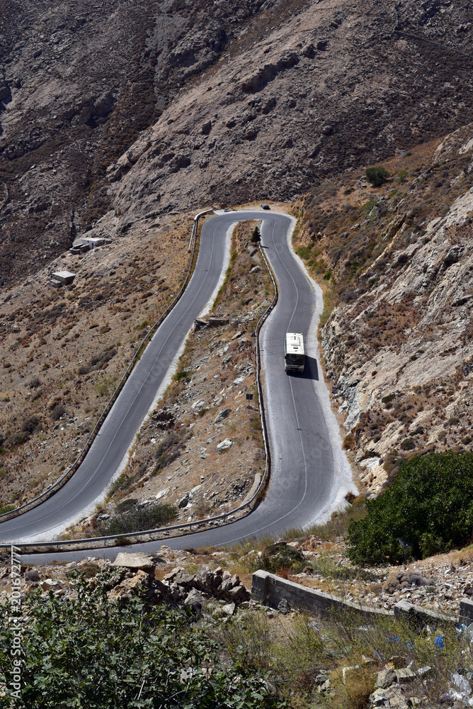 Curved road between Livadi Town abd Chora Village in Serifos Island, Greece