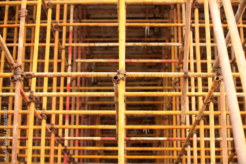 Scaffolding is on the construction site. Scaffolding is on the construction site.
