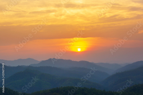 Aerial view of mountain range with warm sunlight, shade and shadow, sunset sunrise from Mae Hong Son province Thailand