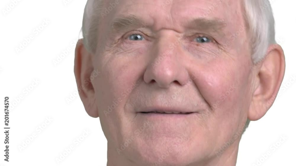 Caucasian elderly person close up. Face of senior european pensioner isolated on white background. Smiling older man close up. Caucasian elderly person close up. Face of senior european pensioner isolated on white background. Smiling older man close up.