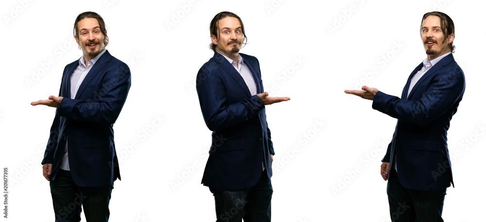 Handsome young man holding something in his empty hand Handsome young man holding something in his empty hand