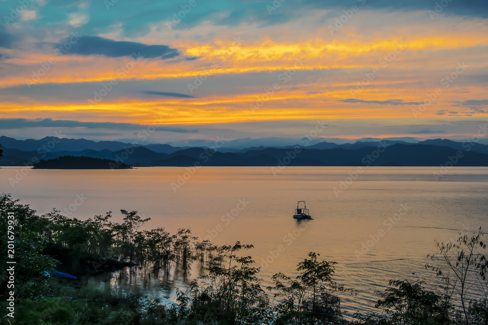 Sunset at lake, Kaeng Krachan Dam, Chaipattana Water Turbine.