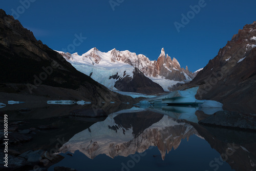 Reflection of the Cerro Torre on the Laguna Torre at pre dawn morning, the mountains in the Southern Patagonian Ice Field in South America.Los Glaciares National Park, El Chalten, Argentina.