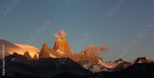 Colourful morning sunrise touch the top of Mount Fitz Roy  a mountain in Patagonia  on the border between Argentina and Chile. Located in the Southern Patagonian Ice Field near Chalt  n.