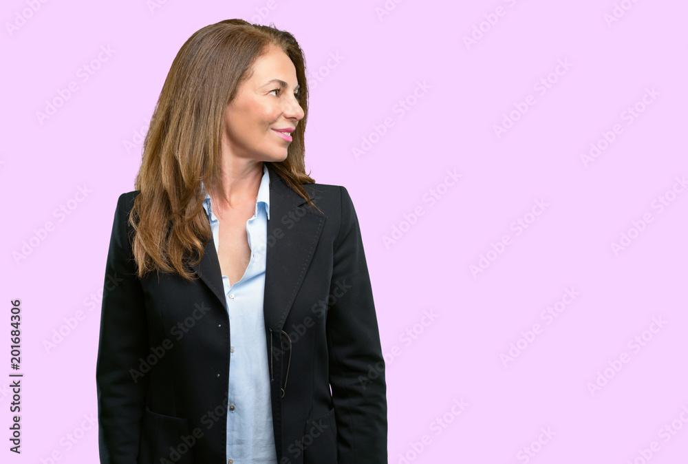 Middle age business woman side view portrait Middle age business woman side view portrait