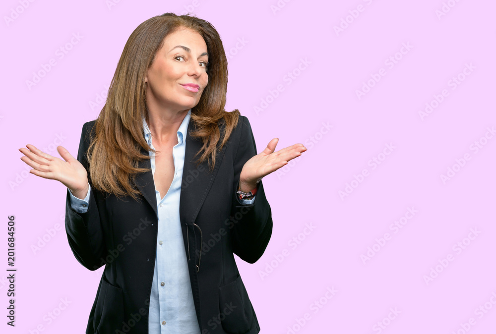 Middle age business woman doubt expression, confuse and wonder concept, uncertain future Middle age business woman doubt expression, confuse and wonder concept, uncertain future